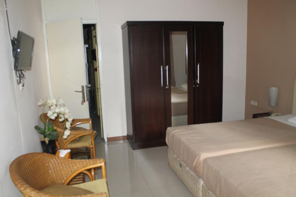 Gondia Guesthouse Jakarta Pokoj fotografie